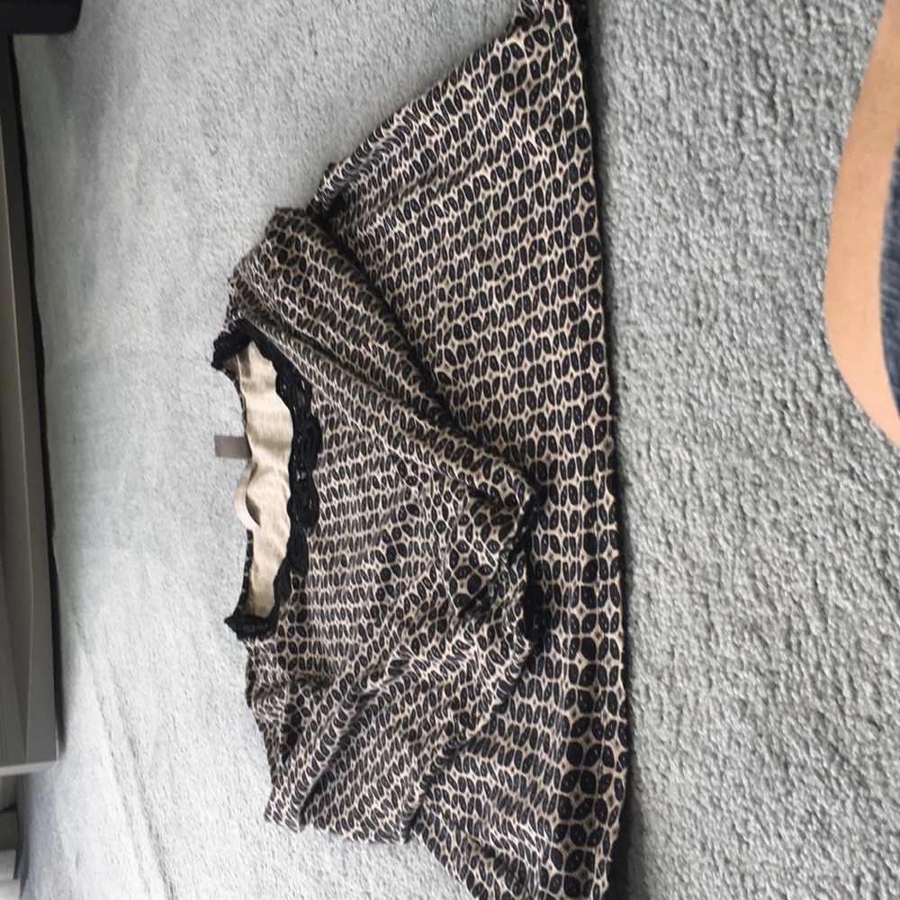 New long sleeve top black and cream design